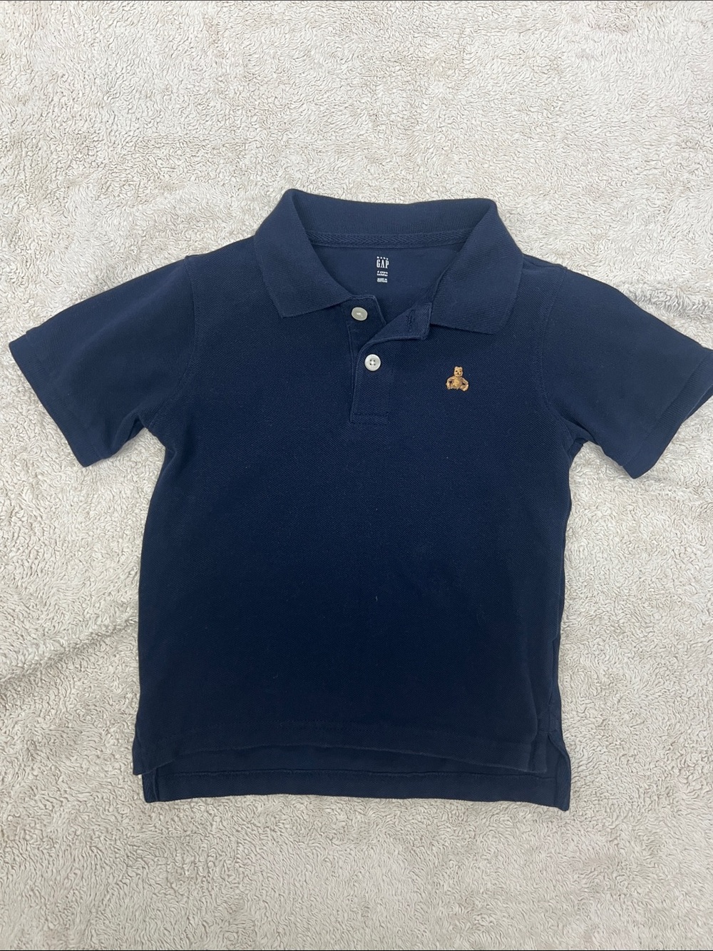 GAP Navy Polo with Small Tan Embroidered Motif